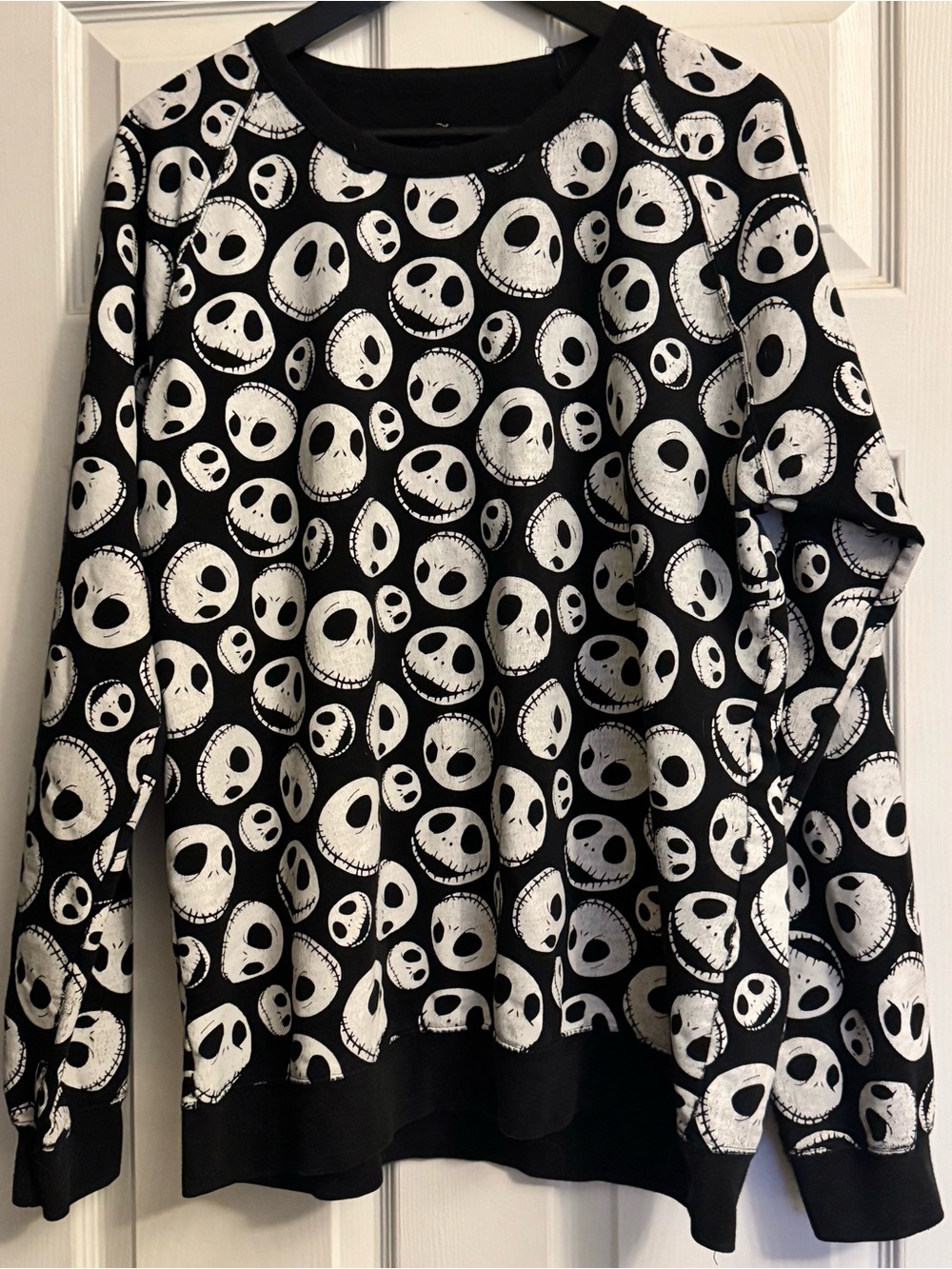 Disney Black Crewneck Sweatshirt with White Jack Skellington Faces